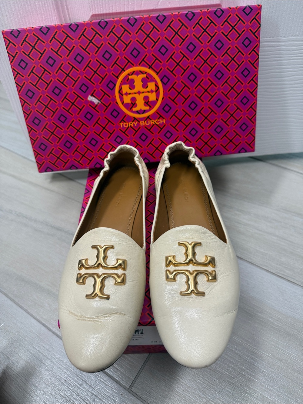 Tory Burch Cream Leather Logo Slip-On Flats with Gold Emblem